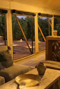 The lounge at Karangoma where you will enjoy a truly african experience. Book with Think Africa Travel